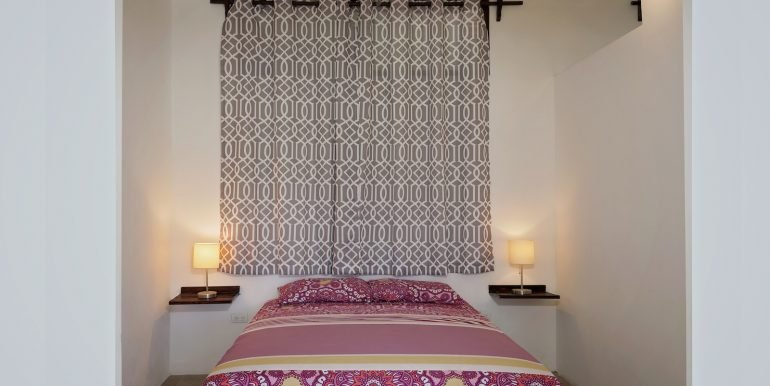 Multiunit Apartment Building in Town - San Juan del Sur - Invest Nicaragua - 2_Bedroom_Apartment_Top_Floor_Left_Side_Bedroom_1_CC