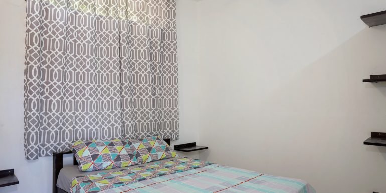 Multiunit Apartment Building in Town - San Juan del Sur - Invest Nicaragua - 2_Bedroom_Apartment_Top_Floor_Left_Side_Bedroom_2_CC