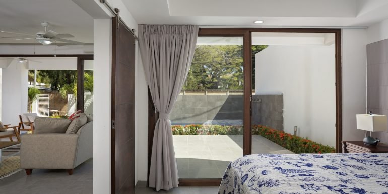 Invest_Nicaragua_Real_Estate_Beach_House_SJDS_Guest_Bed_1_Angle_1_CC_HIGH_RES