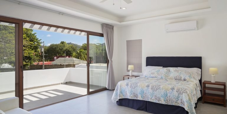 Invest_Nicaragua_Real_Estate_Beach_House_SJDS_Master_Bed_Angle_1_CC_HIGH_RES