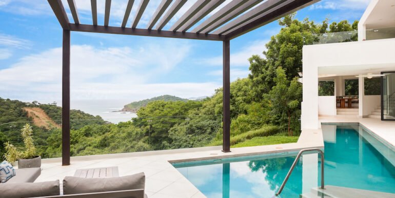 Luxury Home Villa_Artista_Pool_Deck_Ocean_View_Angle_1_CC_REV