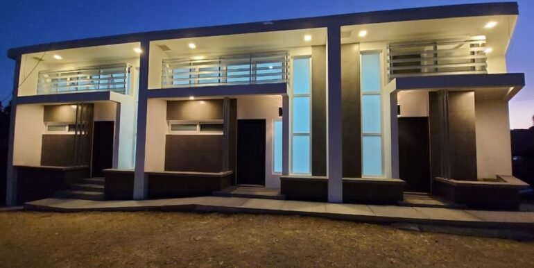 23 Triplex Street view night whole build